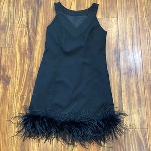 Side zipper and lined w feather bottom